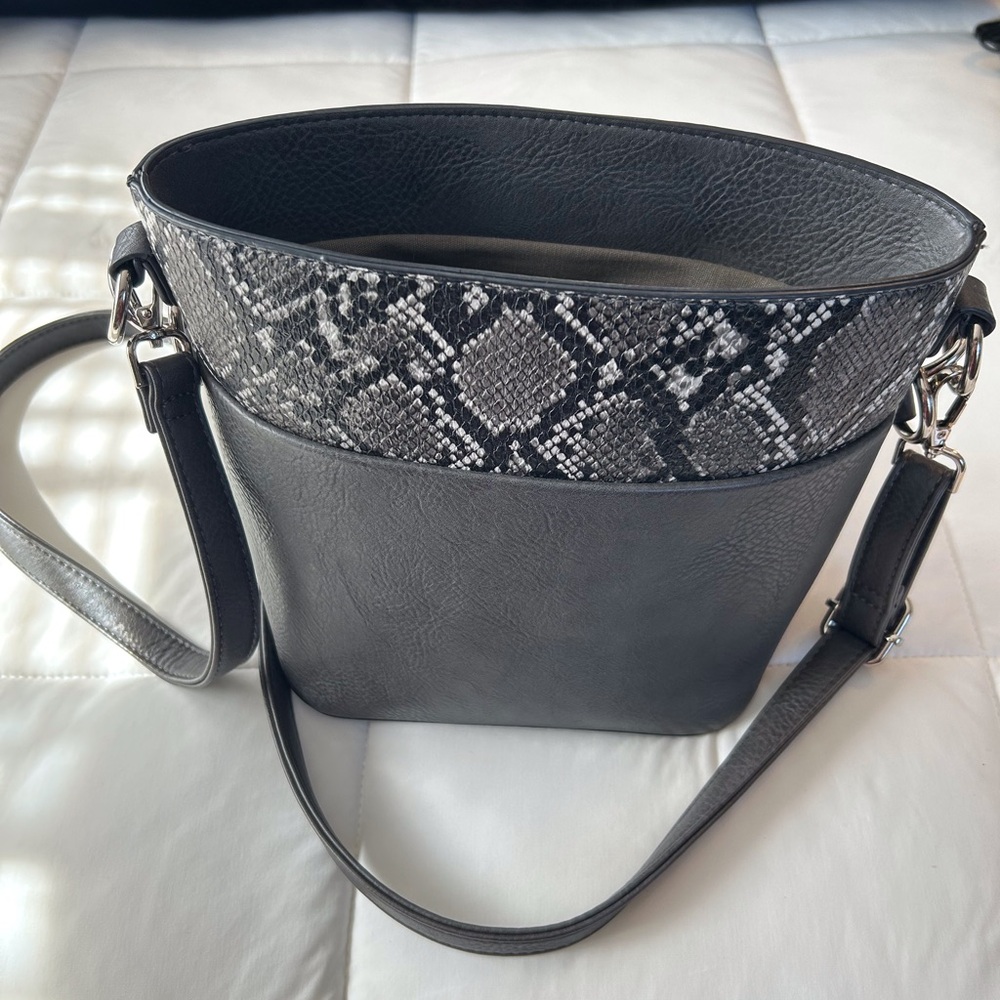 Bucket bag with snakeskin accents